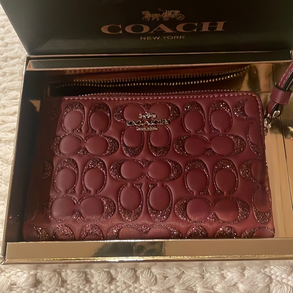 Coach burgundy wristlet